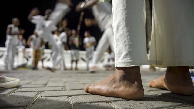 Brazilian capoeira group performing at night in Salvador, Bahia,