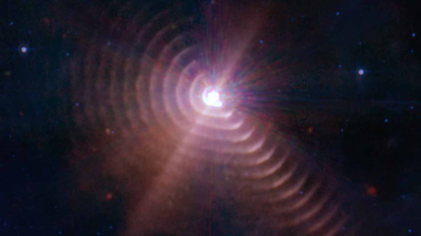 Capta el Telescopio Espacial James Webb imagen de polvo generado por el choque de vientos entre dos estrellas masivas