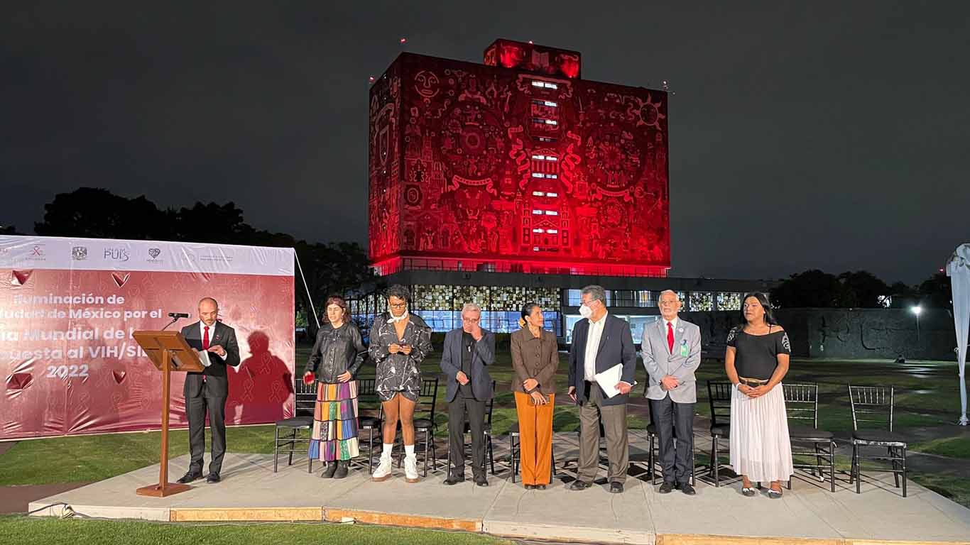 La UNAM se suma a la lucha contra el SIDA con iluminación roja de la Rectoría y Biblioteca Central